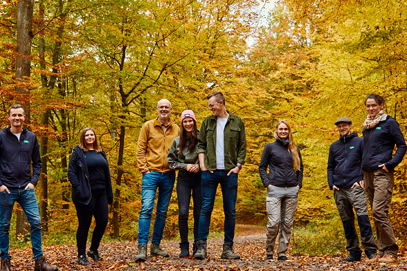 People standing on forest path